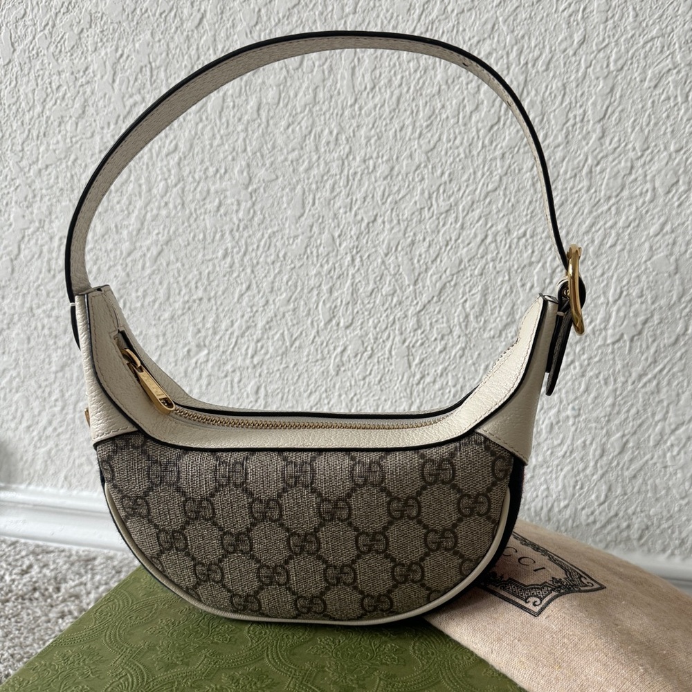 GUCCI
GG Supreme Ophidia Mini Bag Authentic